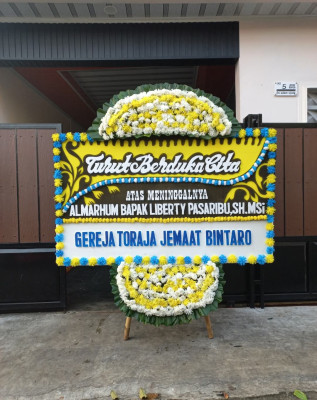 Papan Bunga Duka di Waeapo
